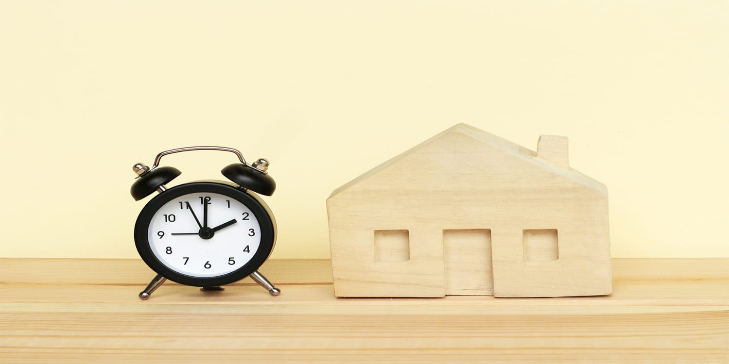 clock and house, need to move soon concept